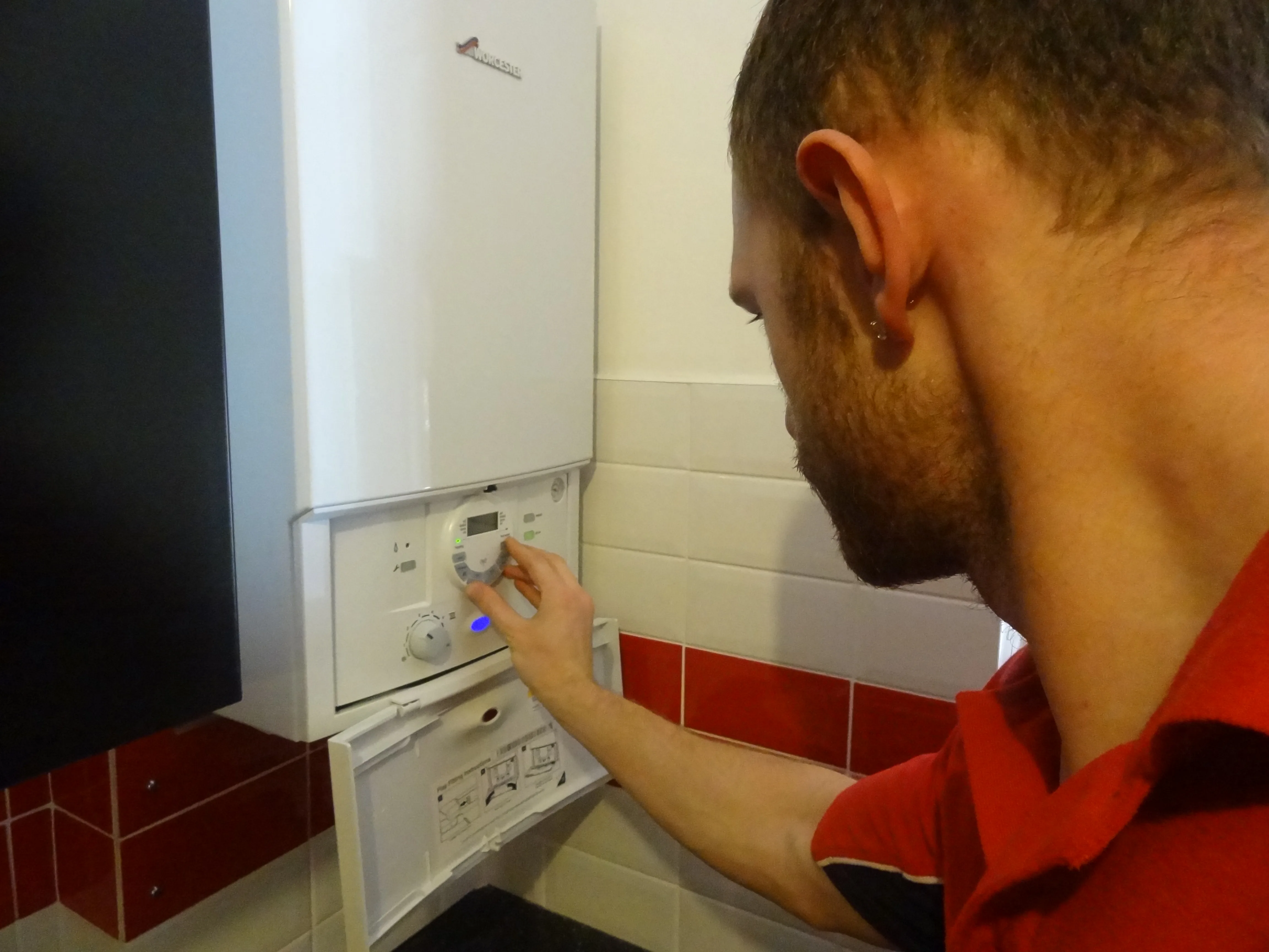 Sunbury Plumbers engineer working on a boiler installation in Sunbury-on-Thames